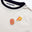 tee-shirt More Perpète enfant, mixte en coton bio, zoom sur les patchs poitrine, un patch smiley et un patch P.